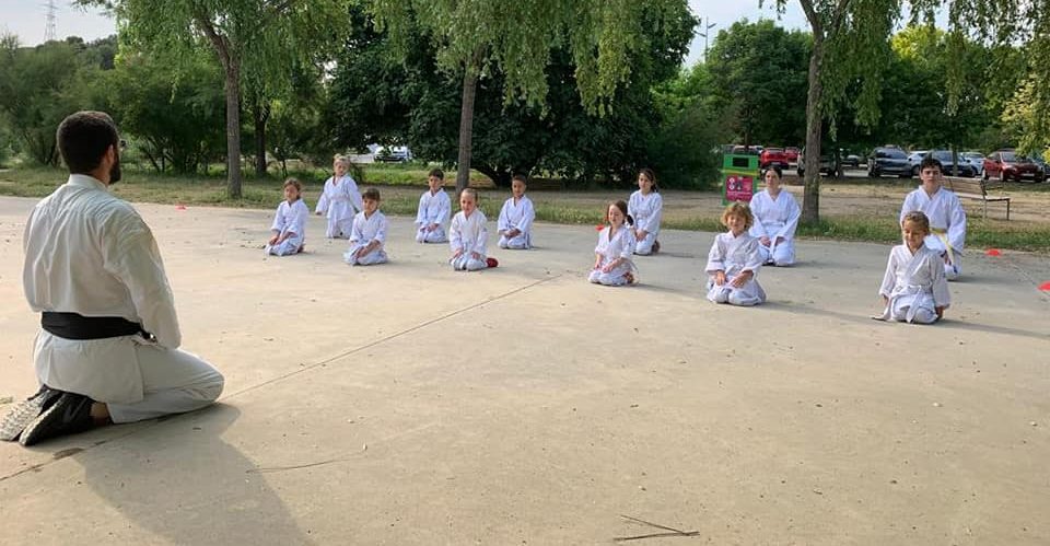 People practicing Karate outdoors
